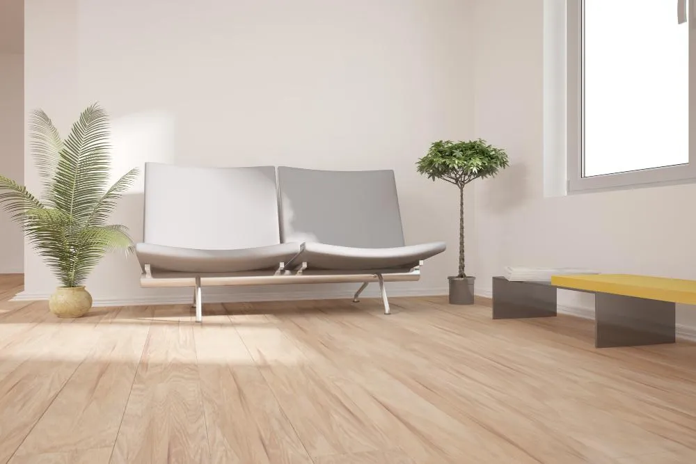 Ambiente acogedor con piso laminado en tono madera natural que aporta equilibrio al diseño interior.